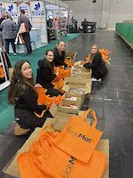 Preparing LickiMat showbags at Crufts 2024
