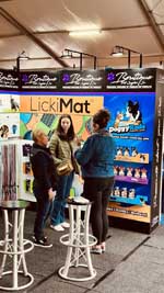 Chatting with visitors to the LickiMat stand at Pet Expo, South Africa